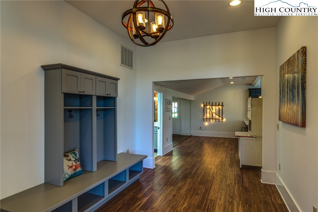2388 Carsonville Road Independence, VA 24348 - Photo 23 of 50 wooden floor in an empty room with a window