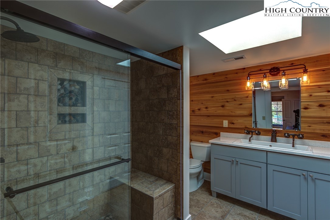 2388 Carsonville Road Independence, VA 24348 - Photo 25 of 50 a bathroom with a sink and a mirror