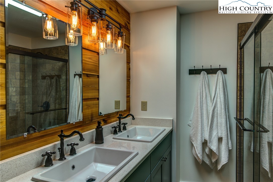 2388 Carsonville Road Independence, VA 24348 - Photo 29 of 50 a bathroom with a sink and mirror