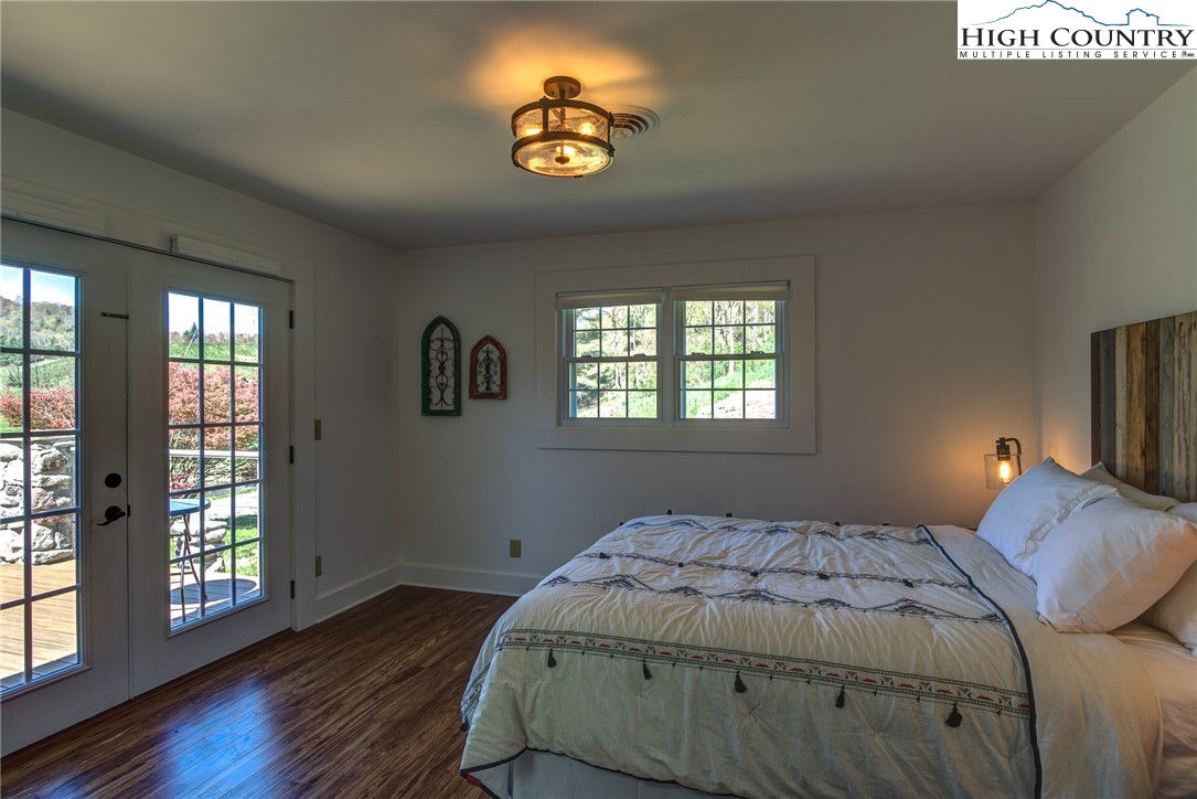 2388 Carsonville Road Independence, VA 24348 - Photo 32 of 50 a bedroom with a bed and a window