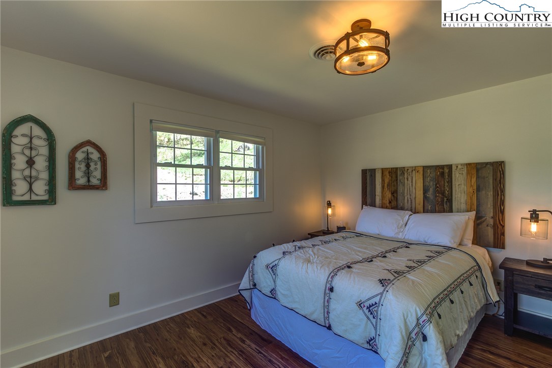 2388 Carsonville Road Independence, VA 24348 - Photo 33 of 50 a bedroom with a bed and a window