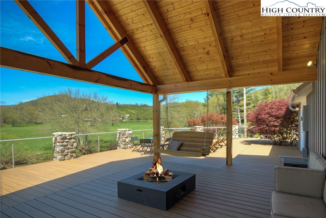 2388 Carsonville Road Independence, VA 24348 - Photo 46 of 50 a living room with furniture and a floor to ceiling window