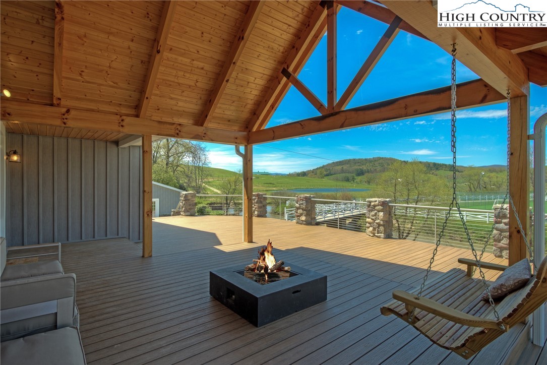 2388 Carsonville Road Independence, VA 24348 - Photo 47 of 50 a living room with patio furniture and a floor to ceiling window
