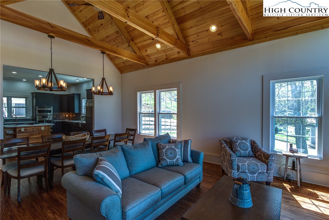 2388 Carsonville Road Independence, VA 24348 - Photo 8 of 50 a living room with furniture ceiling fan and a window