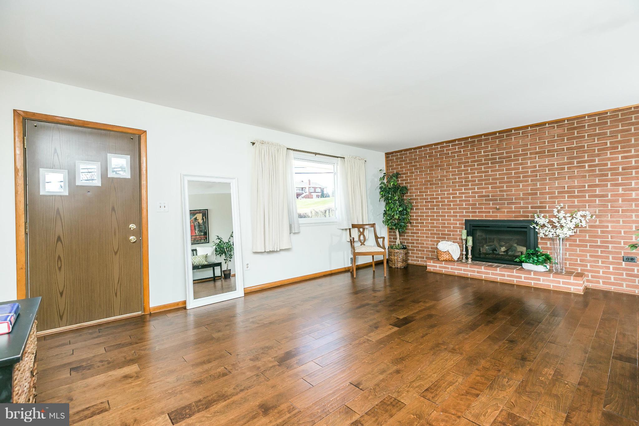 Living Room features gas fireplace 2016