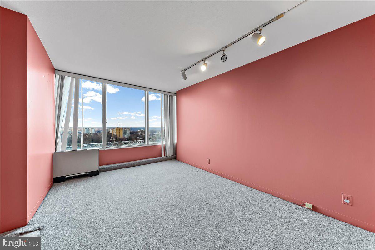 3900 West Ford Road, Unit 17P Philadelphia, PA 19131 - Photo 17 of 28 a view of an empty room with a window