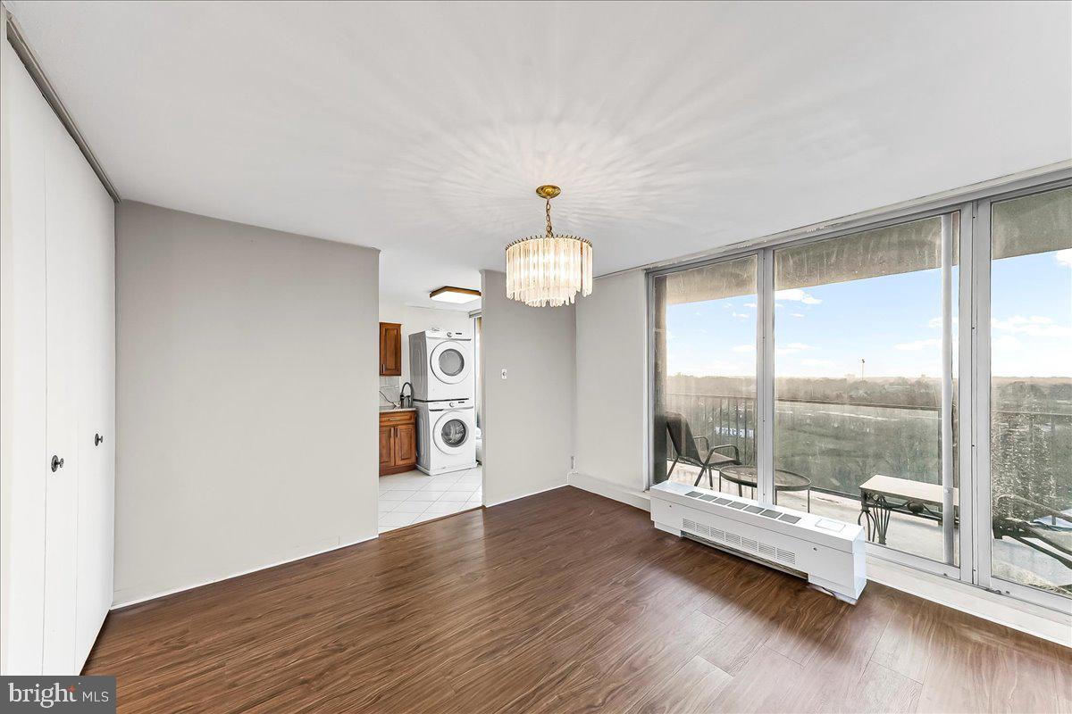 3900 West Ford Road, Unit 17P Philadelphia, PA 19131 - Photo 4 of 28 a view of a room with wooden floor and fan