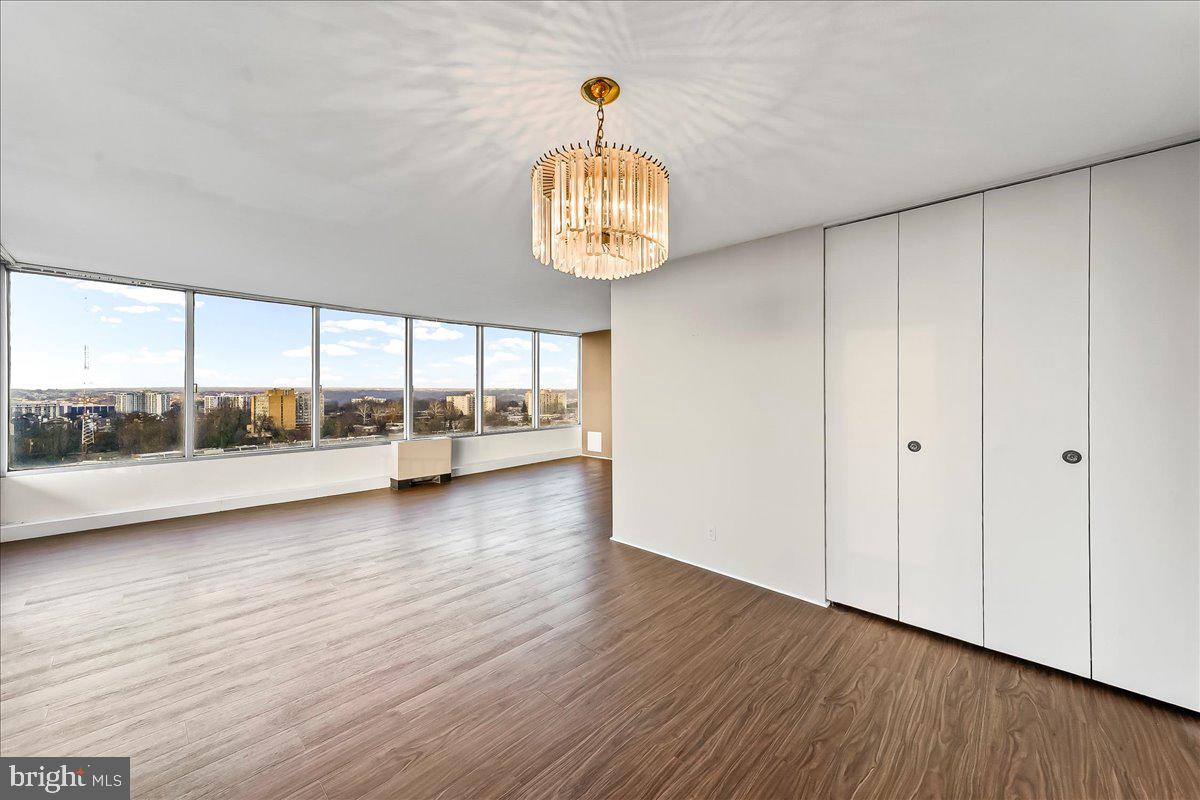 3900 West Ford Road, Unit 17P Philadelphia, PA 19131 - Photo 7 of 28 a view of an entryway with wooden floor