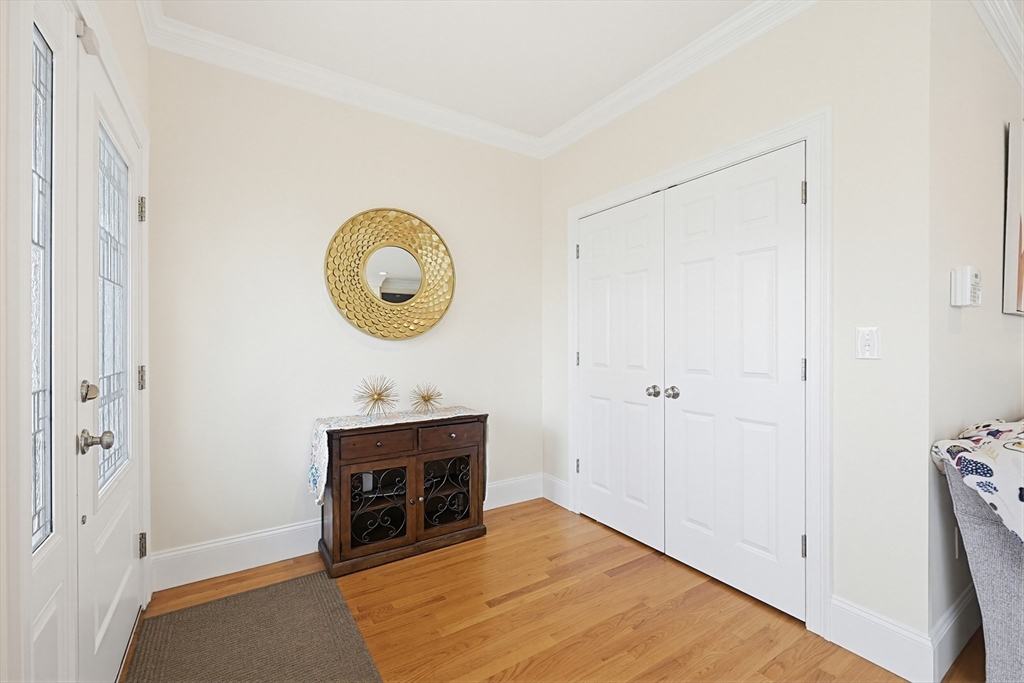 98-100 Lexington Street, Unit 100 Newton, MA 02466 - Photo 16 of 42 a view of a room that has a table and a chair in it
