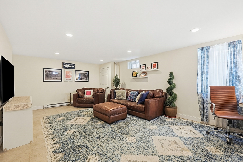98-100 Lexington Street, Unit 100 Newton, MA 02466 - Photo 31 of 42 a living room with furniture