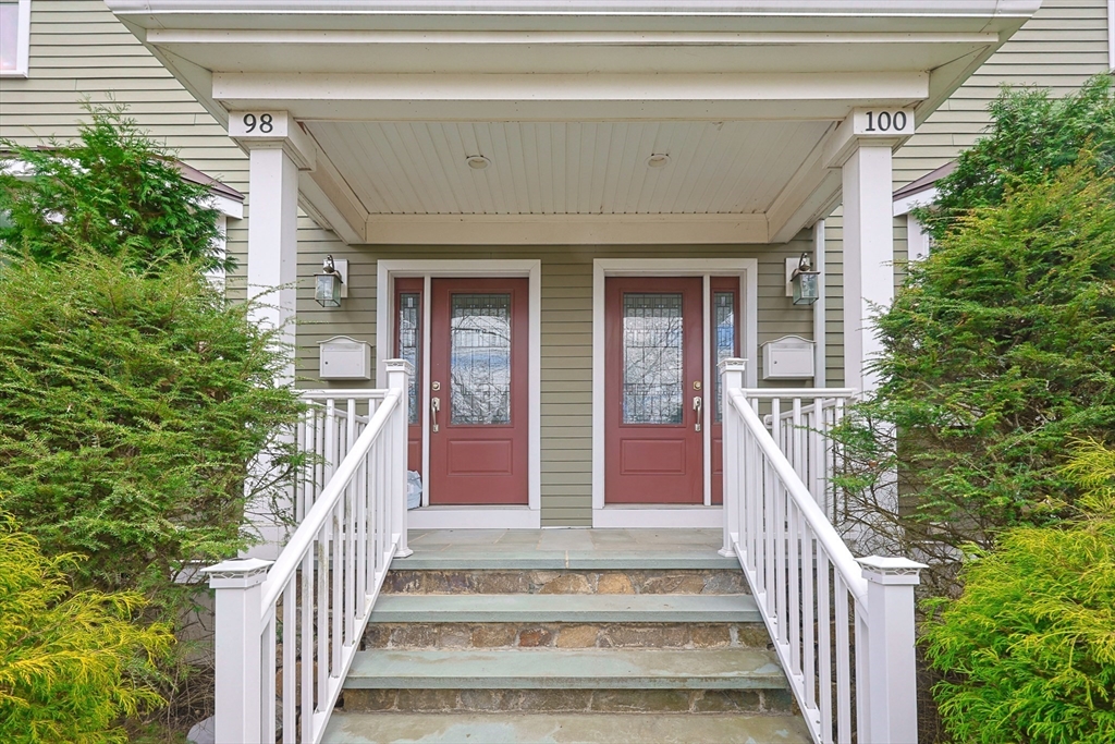 98-100 Lexington Street, Unit 100 Newton, MA 02466 - Photo 41 of 42 a view of a house with wooden floor and fence
