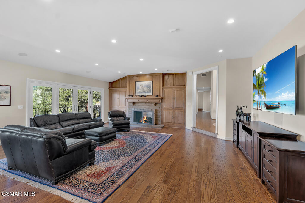 1153 Camino Dos Rios Thousand Oaks, CA 91360 - Photo 11 of 71 a living room with fireplace furniture and a flat screen tv