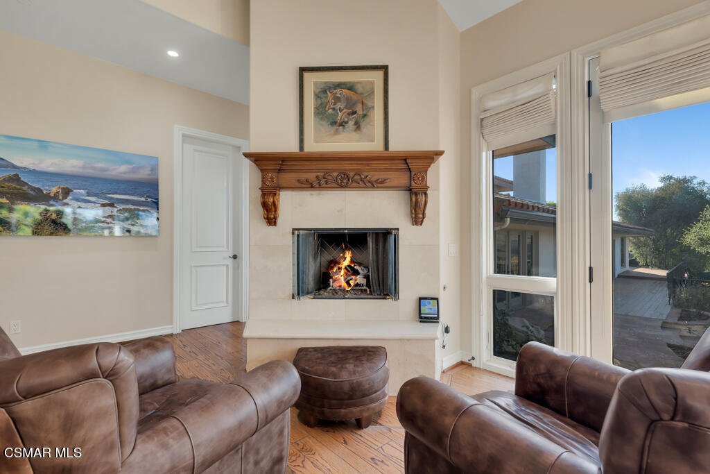 1153 Camino Dos Rios Thousand Oaks, CA 91360 - Photo 27 of 71 a living room with furniture and a fireplace