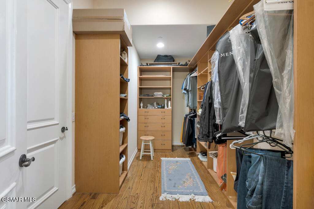 1153 Camino Dos Rios Thousand Oaks, CA 91360 - Photo 29 of 71 a view of walk in closet with clothes