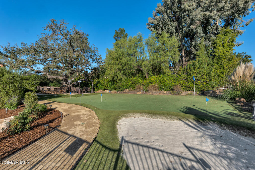 1153 Camino Dos Rios Thousand Oaks, CA 91360 - Photo 46 of 71 a view of a table and chairs on the deck