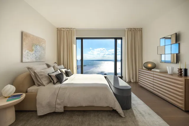 a spacious bathroom with a granite countertop sink a bathtub and a shower