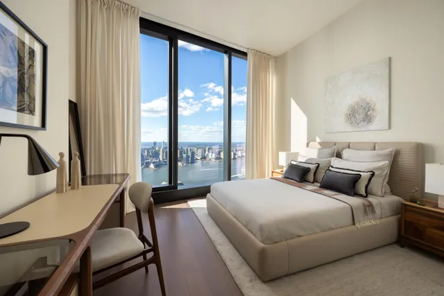 a bathroom with sink mirror and shower