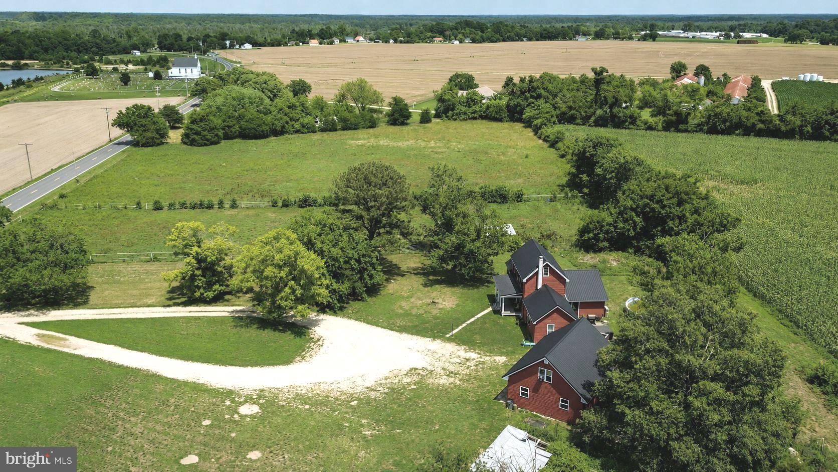 5125 Rhodesdale Road Rhodesdale, MD 21659 - Photo 2 of 50 a view of a lake with a yard and outdoor space