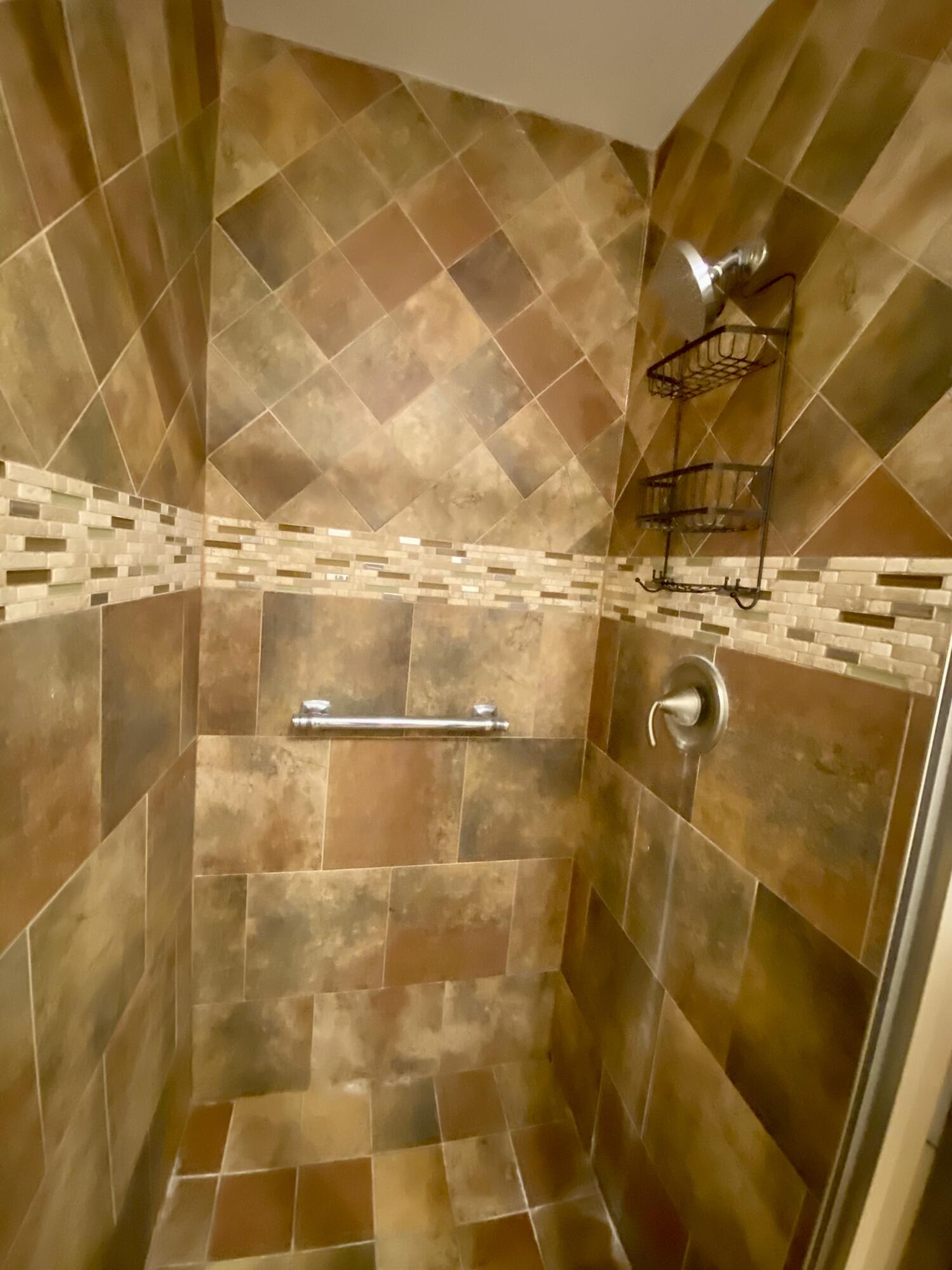 843 Flanders South Delray Beach, FL 33484 - Photo 18 of 29 a bathroom with a shower