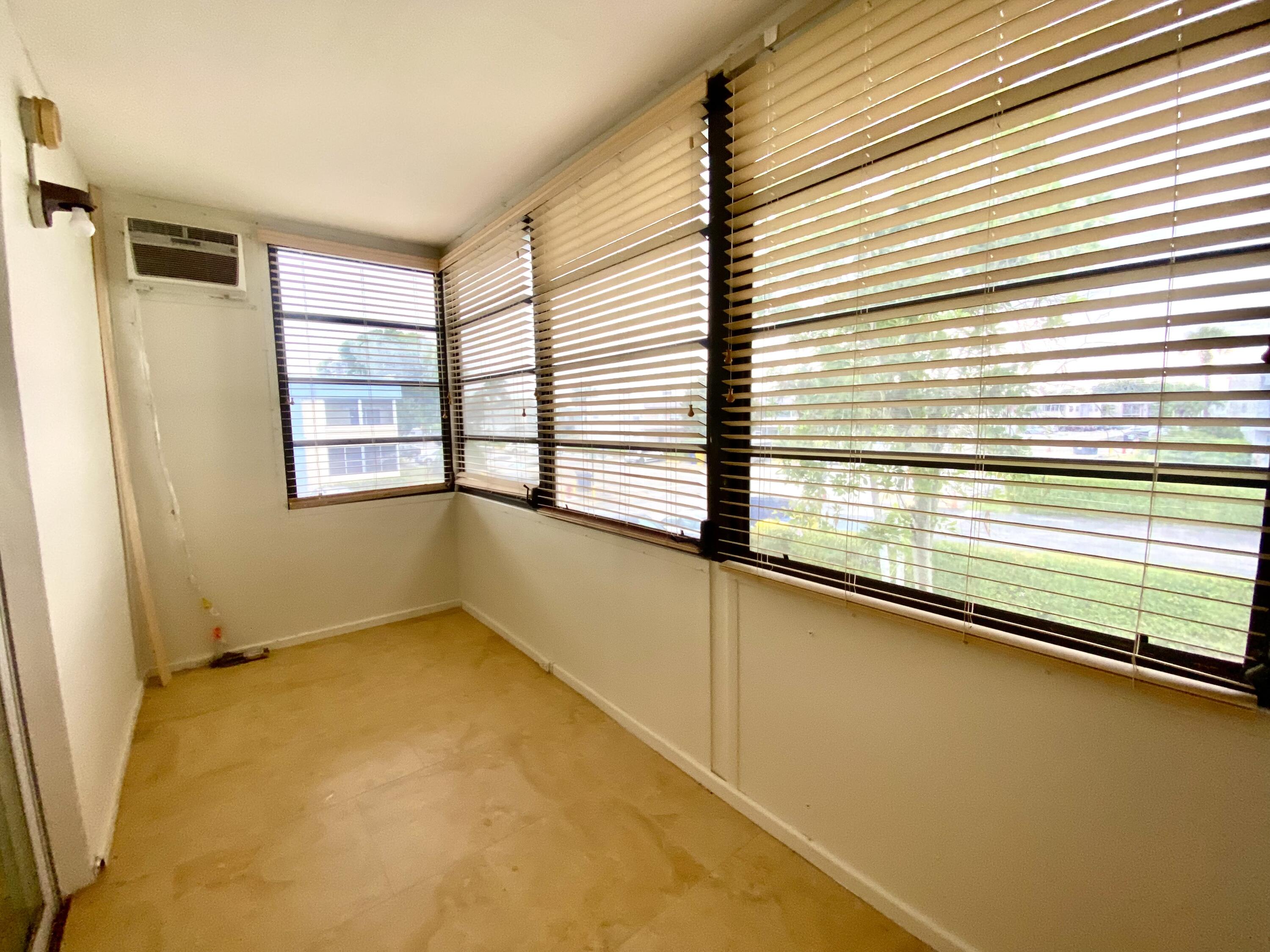 843 Flanders South Delray Beach, FL 33484 - Photo 22 of 29 a view of an empty room with a window