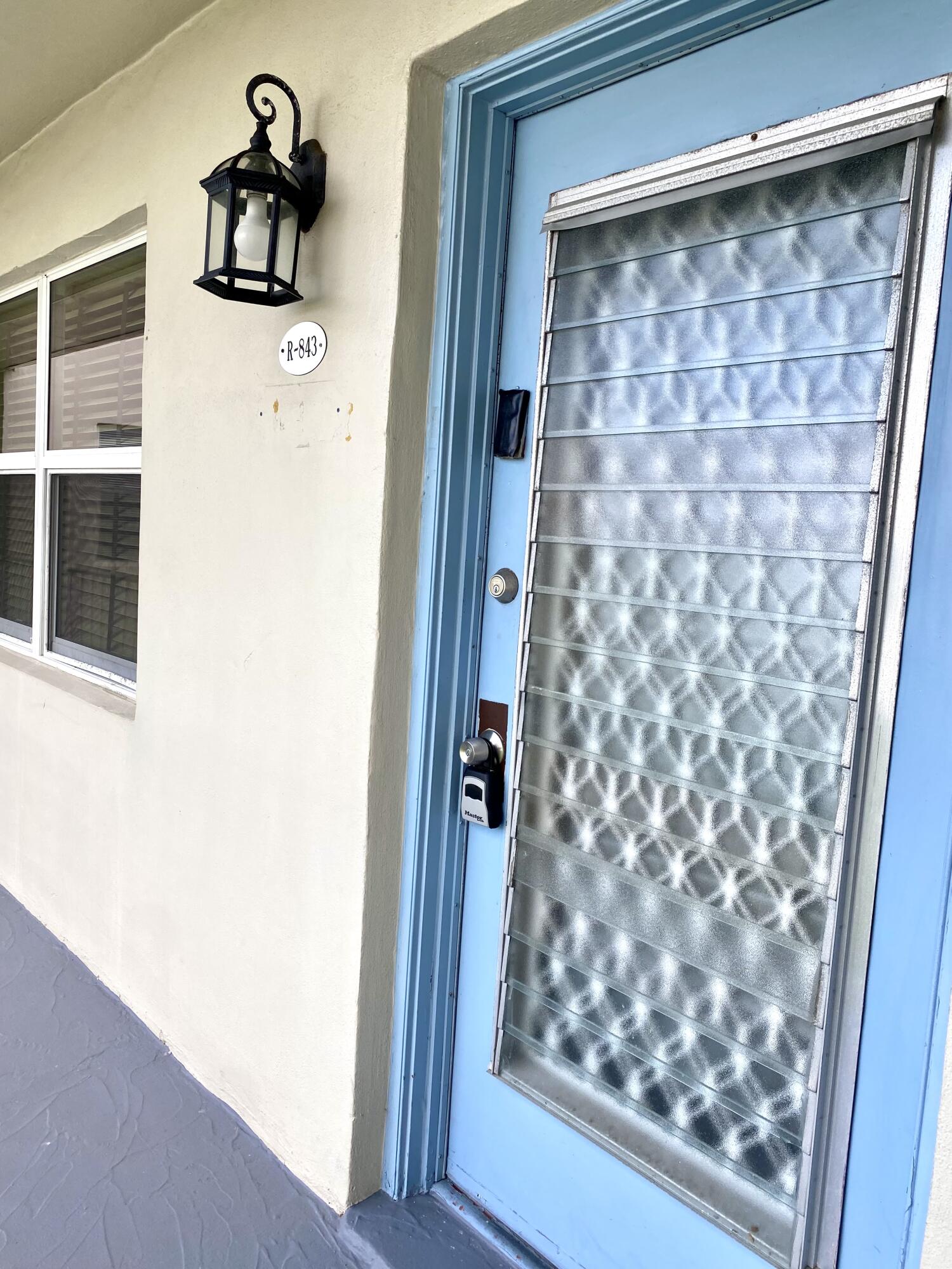 843 Flanders South Delray Beach, FL 33484 - Photo 25 of 29 a bathroom with a shower and a sink