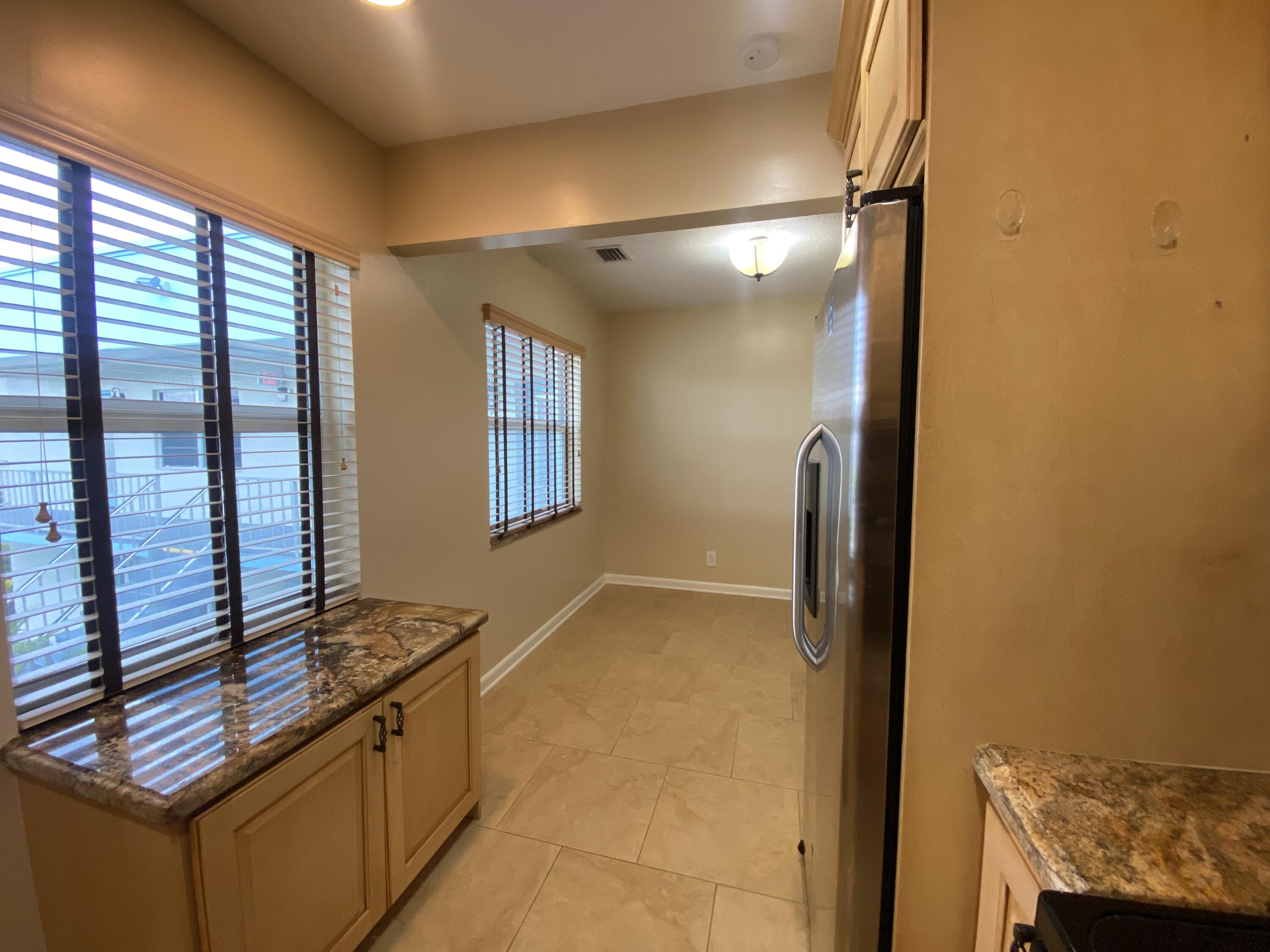 843 Flanders South Delray Beach, FL 33484 - Photo 5 of 29 a view of a hallway with workspace