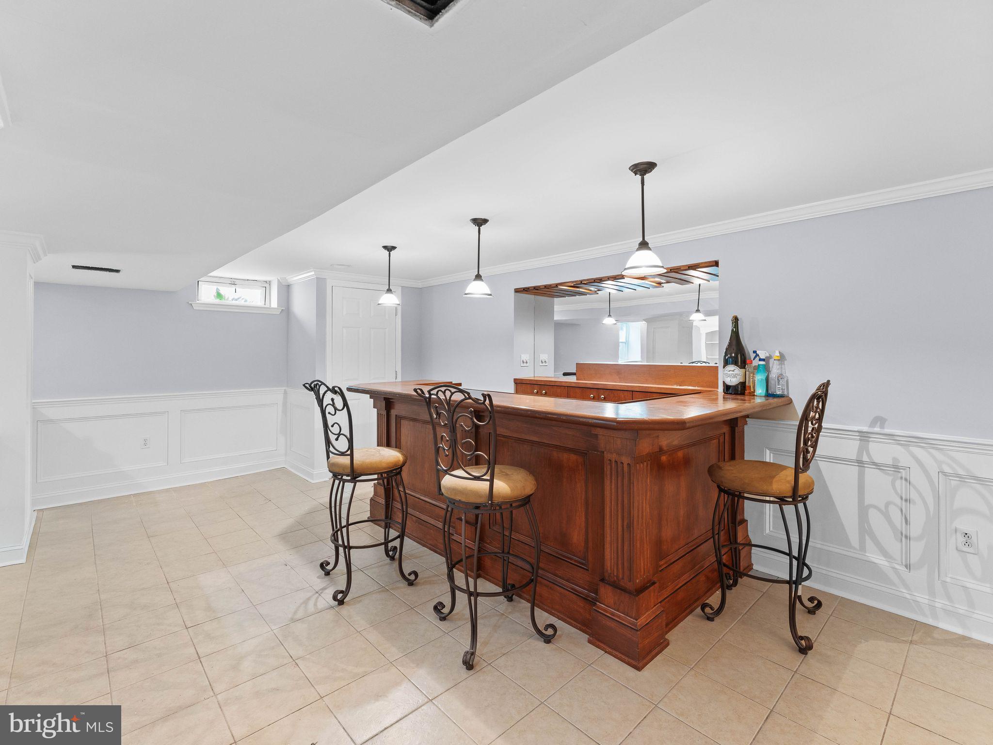 8 Chesterfield Road Sewell, NJ 08080 - Photo 40 of 57 a view of a dining room with furniture and a chandelier