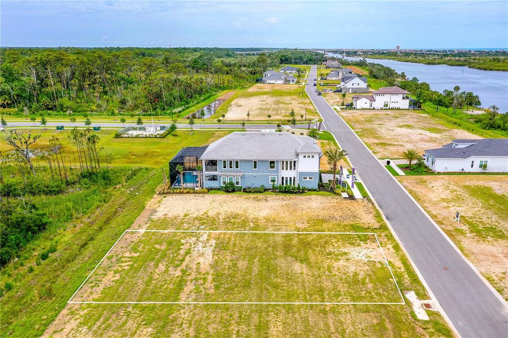 89 Coronado Road Flagler Beach, FL 32136 - Photo 13 of 19 a view of a swimming pool and outdoor space
