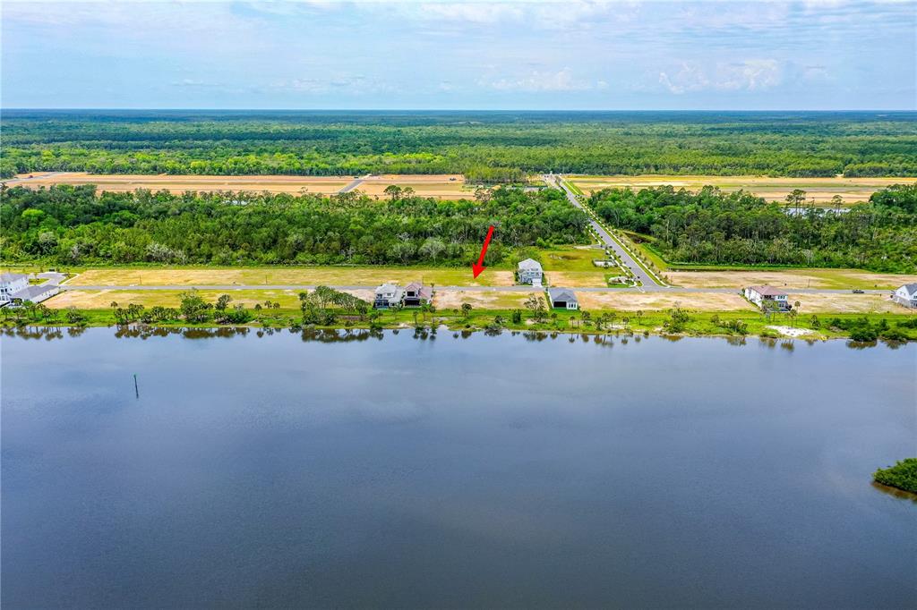 89 Coronado Road Flagler Beach, FL 32136 - Photo 14 of 19 a view of an outdoor space and swimming pool
