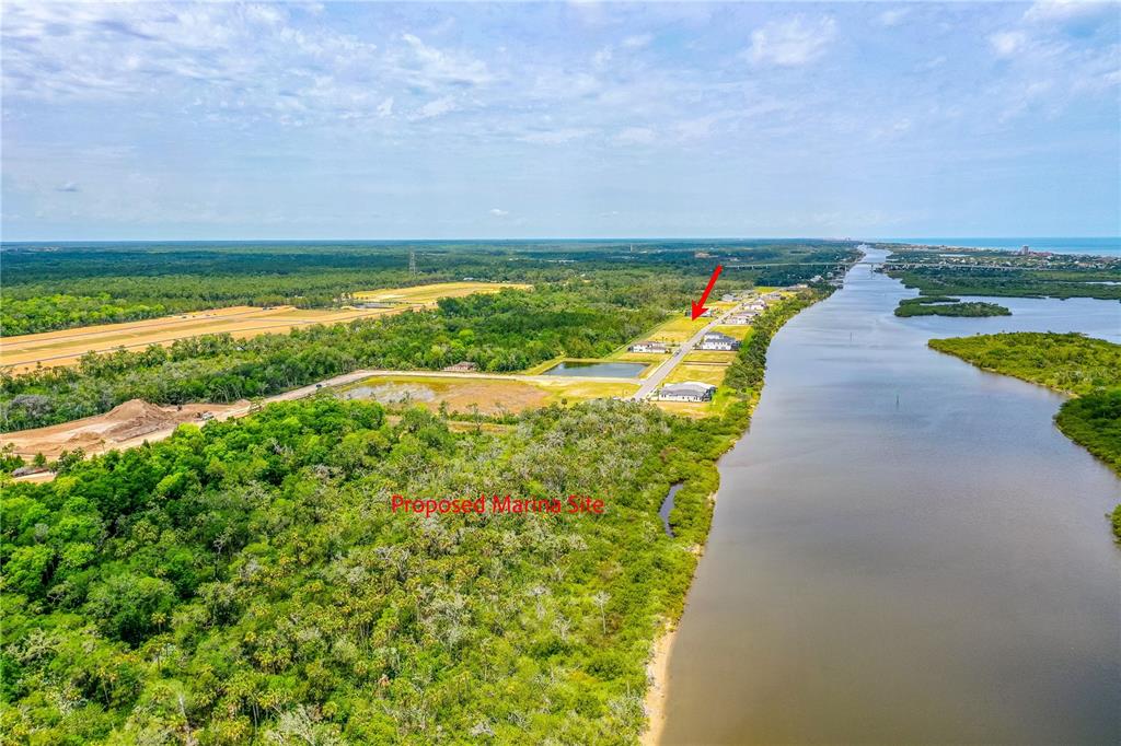 89 Coronado Road Flagler Beach, FL 32136 - Photo 15 of 19 a view of an outdoor space and a lake view