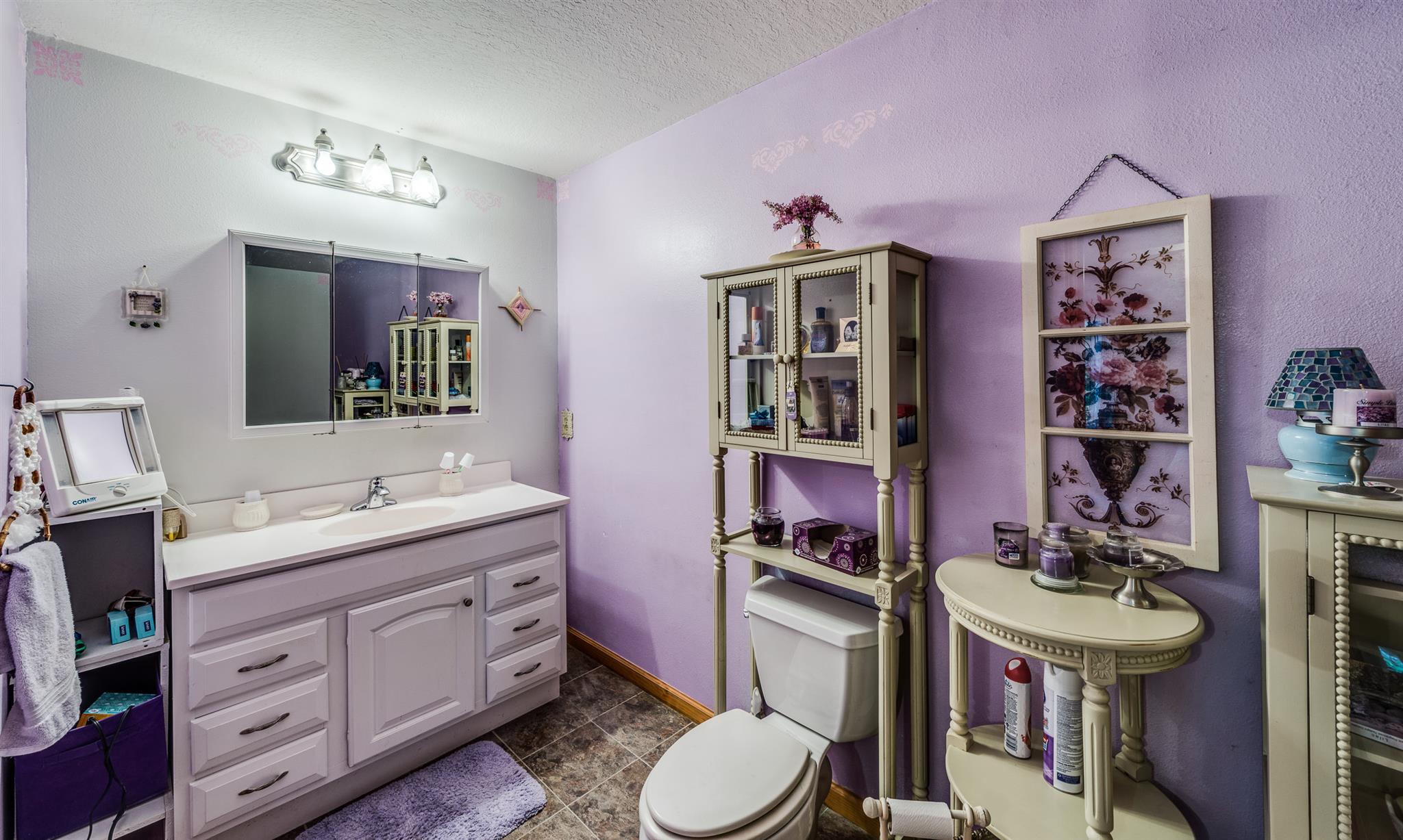 1774 York Road Crossville, TN 38555 - Photo 14 of 25 a bathroom with a toilet sink and mirror
