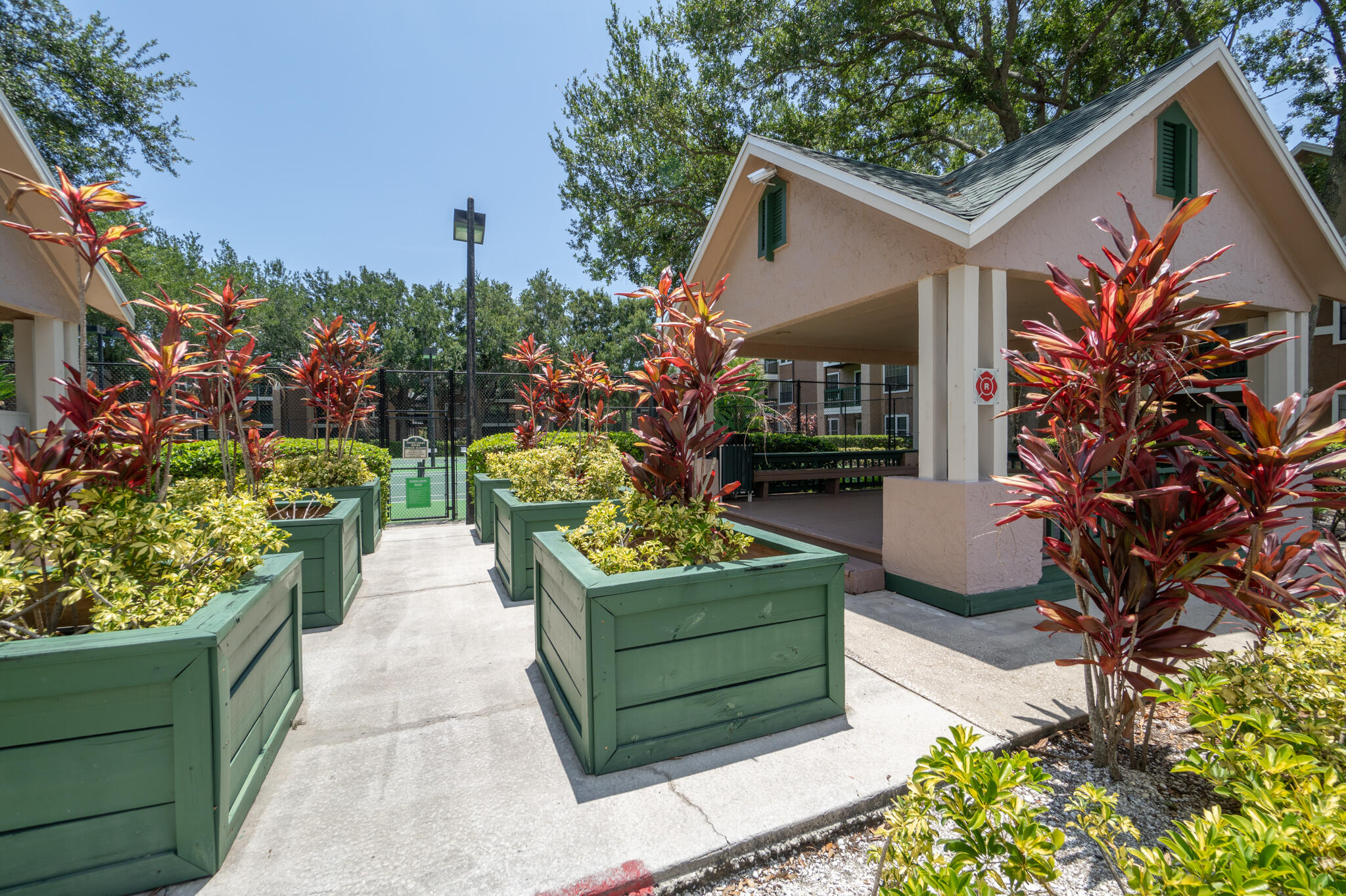 7667 North Wickham Road, Unit 511 Melbourne, FL 32940 - Photo 38 of 48 a front view of a house with a garden