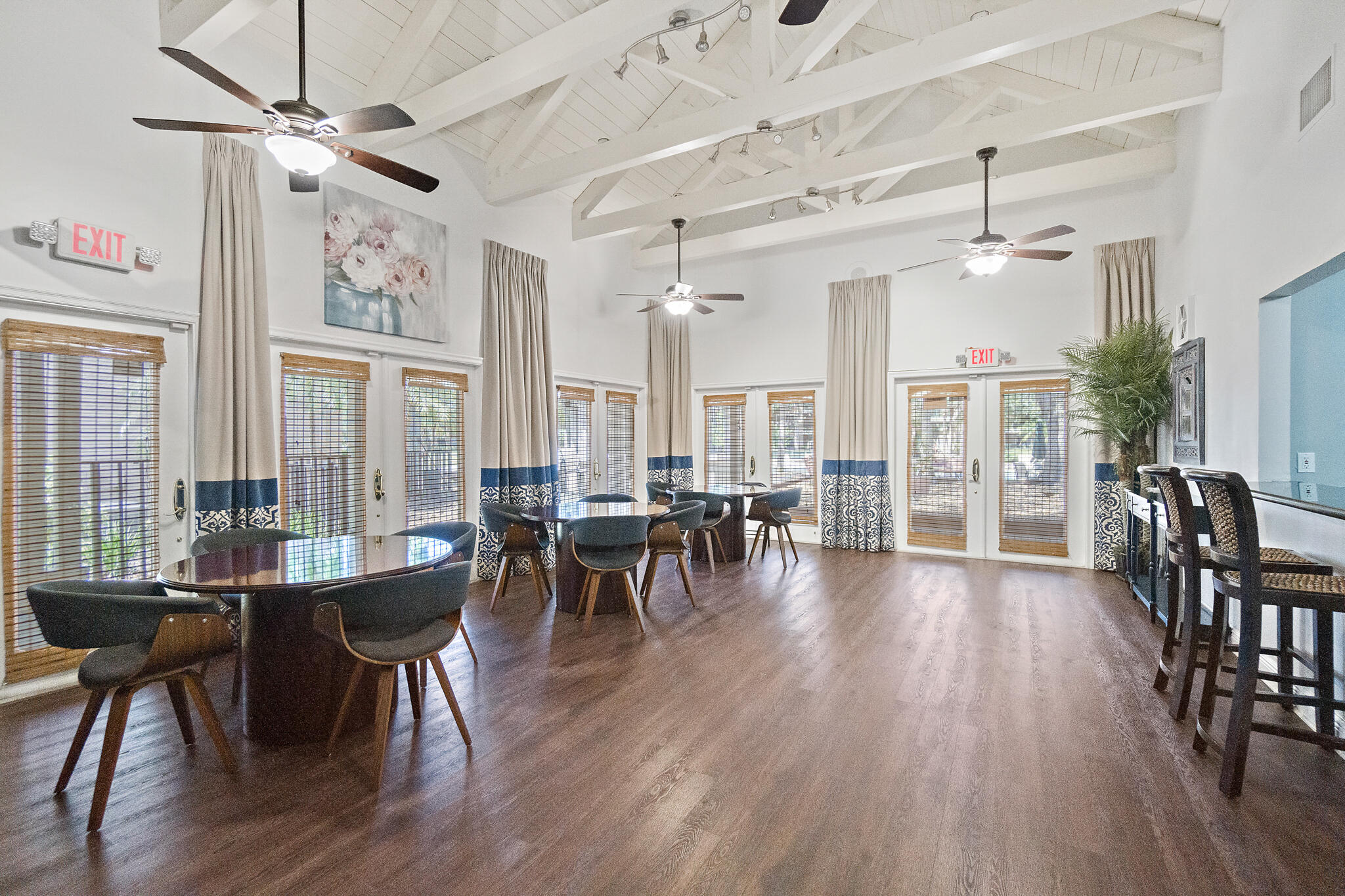 7667 North Wickham Road, Unit 511 Melbourne, FL 32940 - Photo 44 of 48 a view of a dining room with furniture window and wooden floor