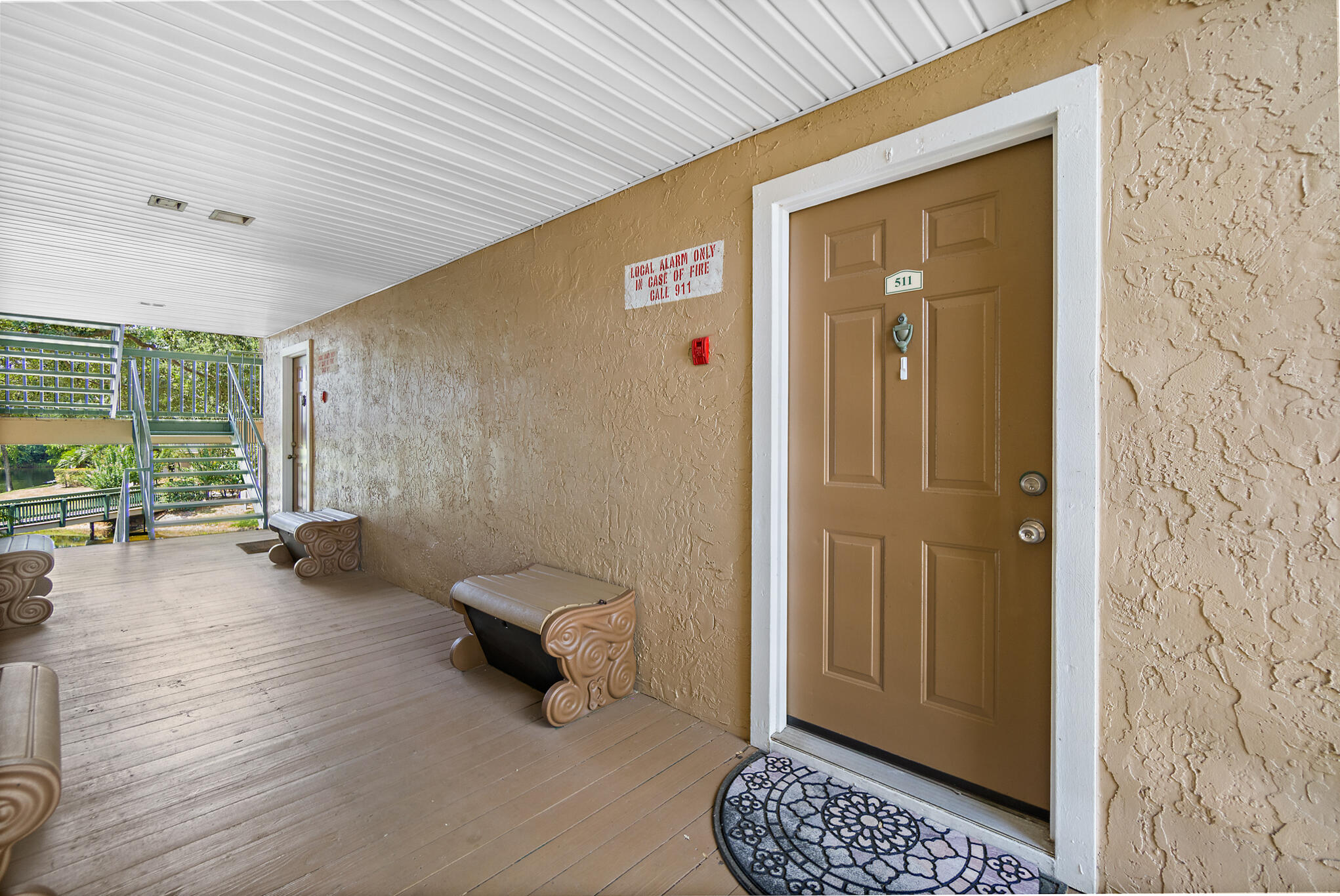 7667 North Wickham Road, Unit 511 Melbourne, FL 32940 - Photo 5 of 48 a living room with furniture and a table