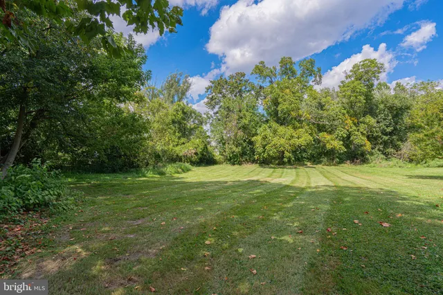 a view of a golf course with a yard