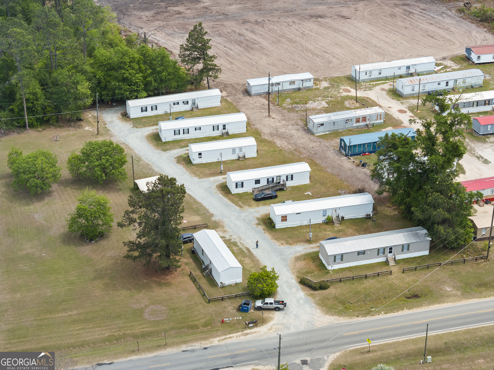 227 Bell Telephone Road Hazlehurst, GA 31539 - Photo 16 of 20 an aerial view of residential houses with outdoor space
