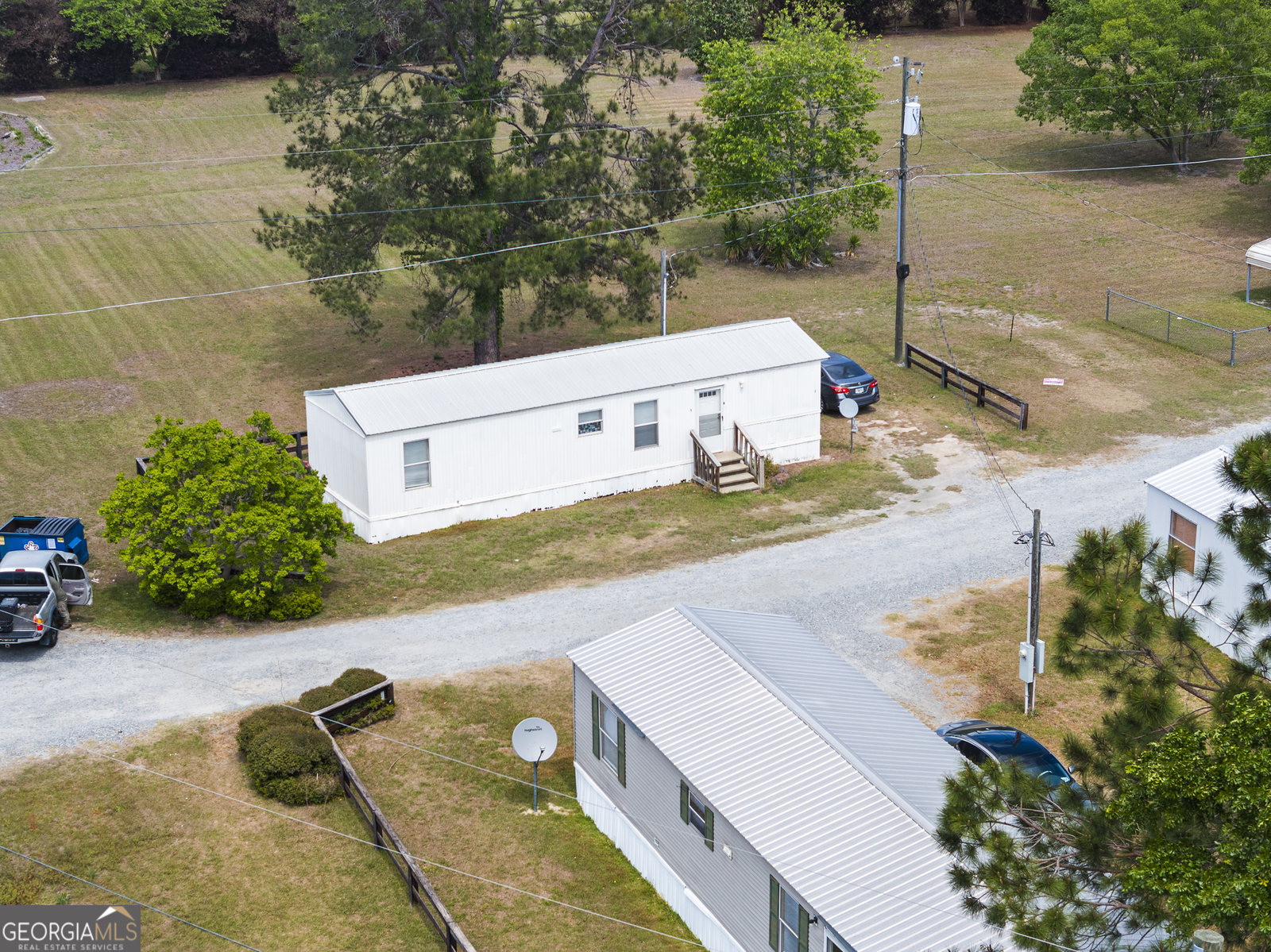 227 Bell Telephone Road Hazlehurst, GA 31539 - Photo 17 of 20 a view of a street with a sitting area
