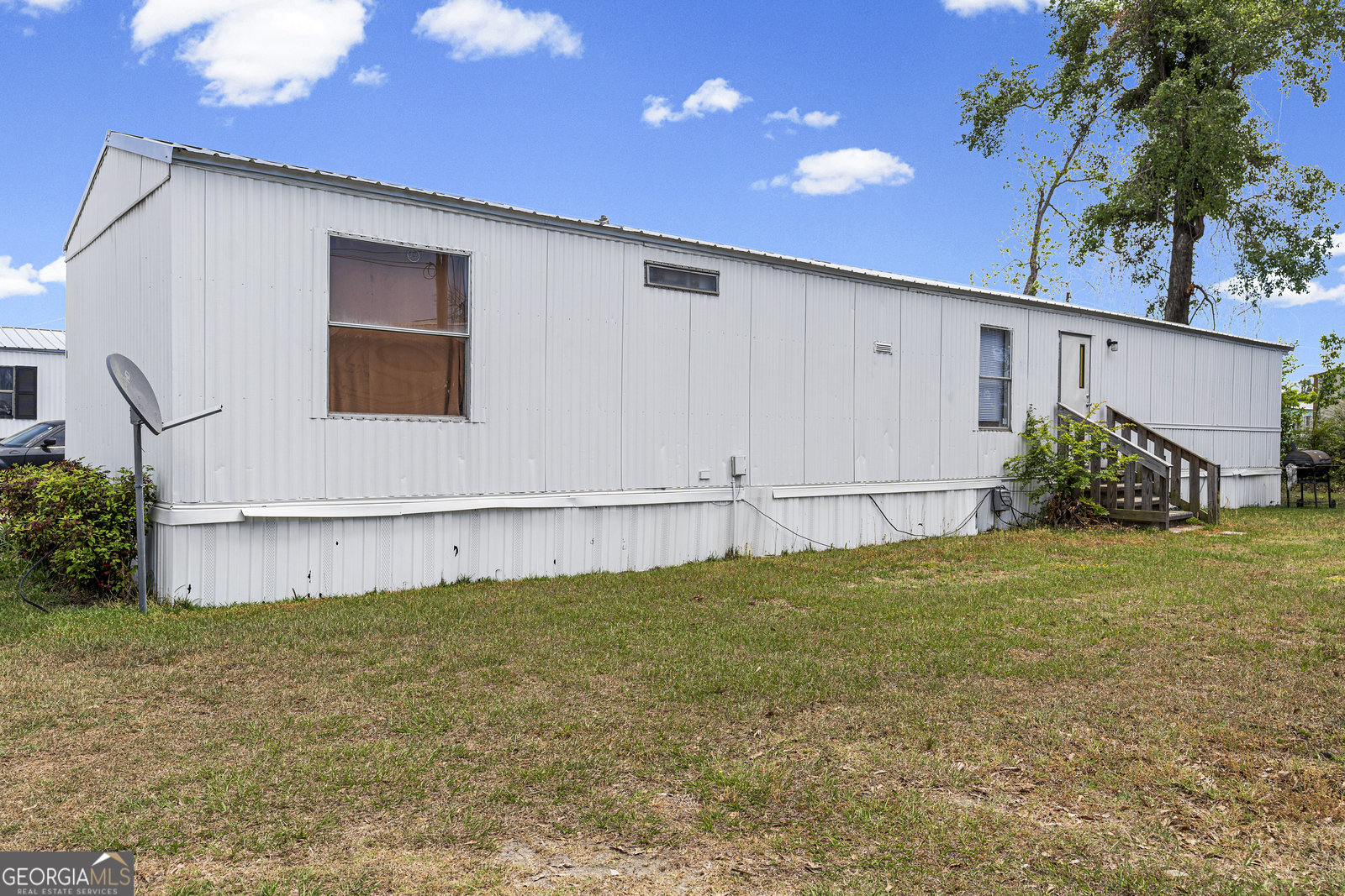 227 Bell Telephone Road Hazlehurst, GA 31539 - Photo 10 of 20 a view of a backyard