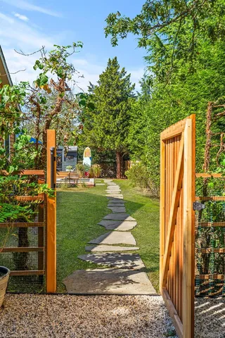 a view of a garden with pathway