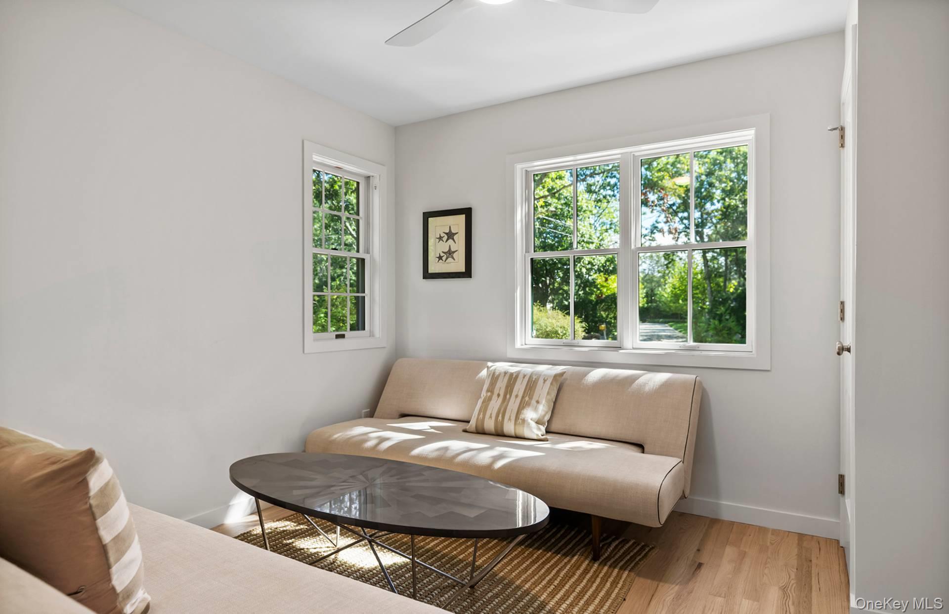 7 Sims Avenue Sag Harbor, NY 11963 - Photo 26 of 30 a living room with furniture and a window