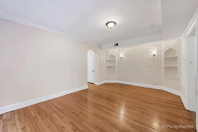 an aerial view of residential houses with city view