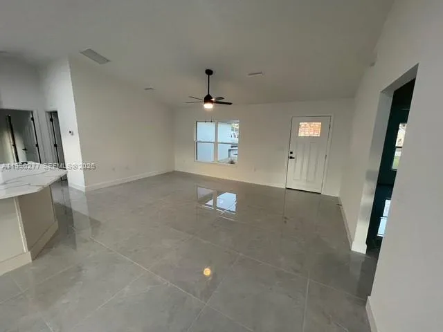 a kitchen with a stove and a microwave
