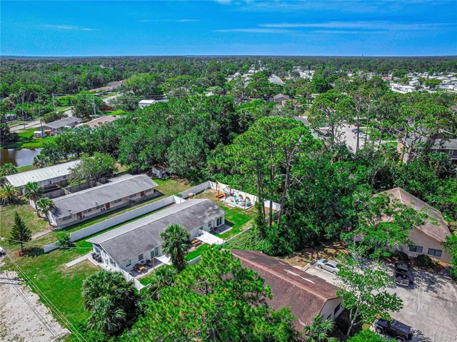 an aerial view of a house with garden