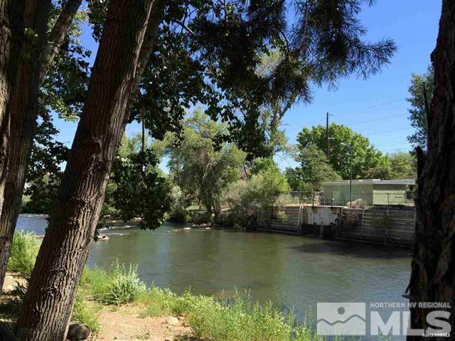 1200 Riverside Drive, Unit 1268 Reno, NV 89503 - Photo 1 of 1 a view of a lake in a forest