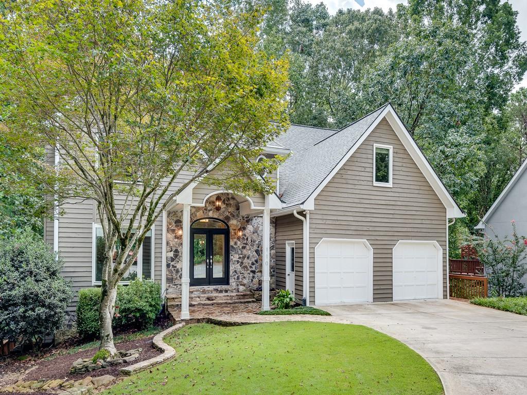 110 Bitternut Circle Roswell, GA 30076 - Photo 1 of 1 a view of a house with yard and tree s