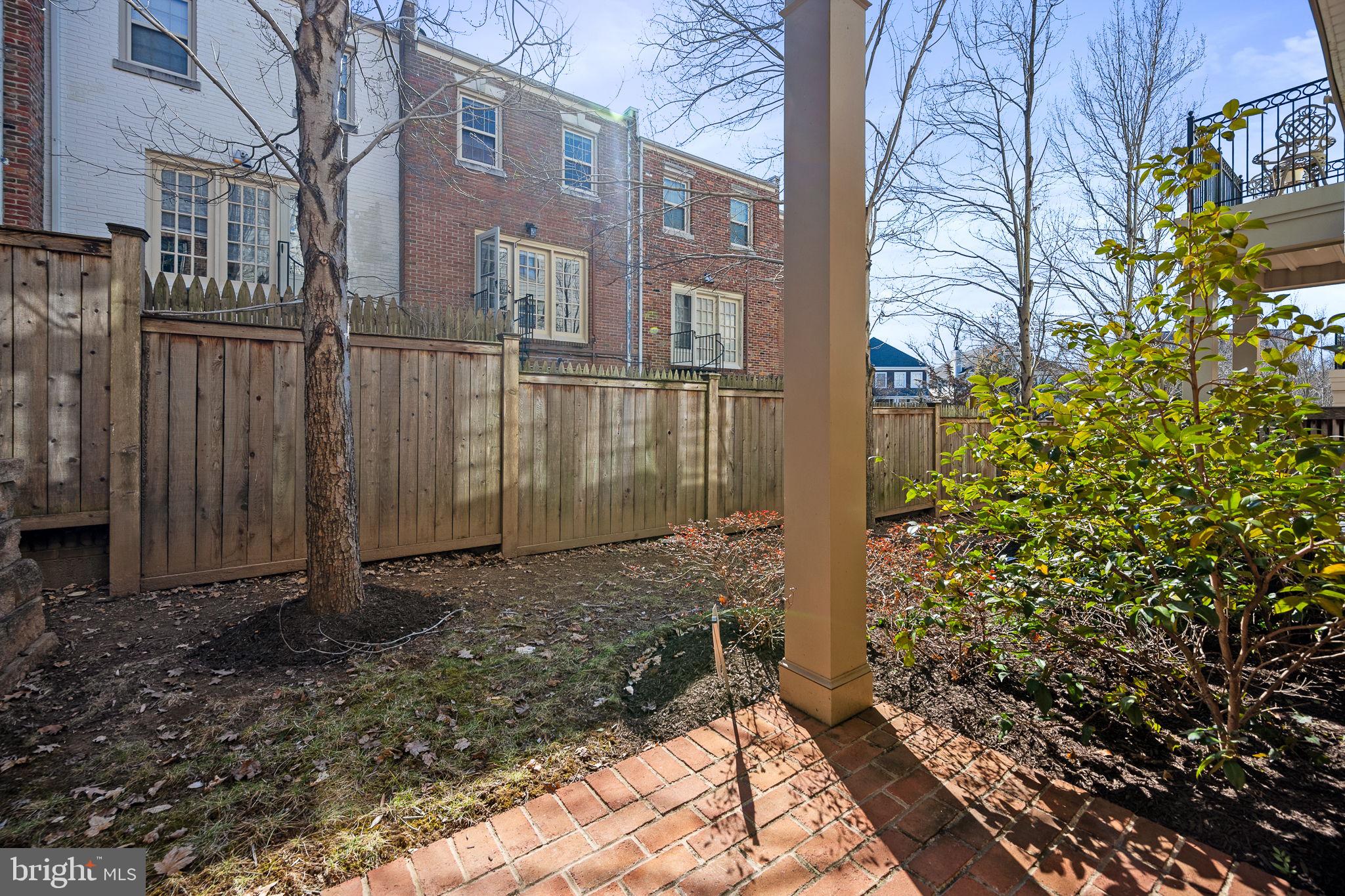 1411 Ridgeview Way Washington, DC 20007 - Photo 13 of 56 a backyard of a building
