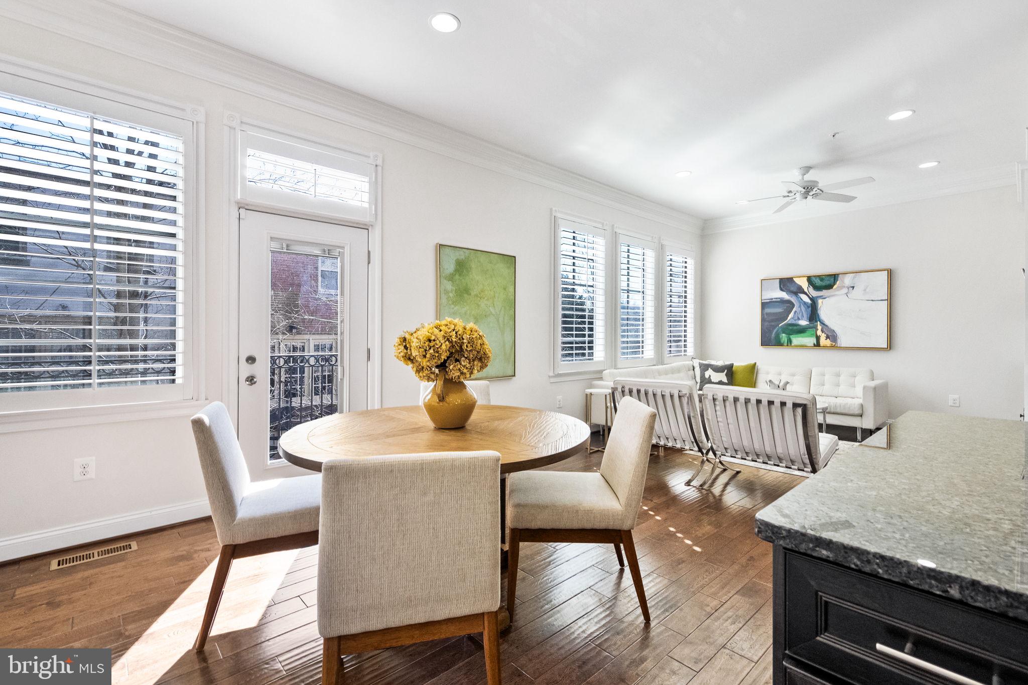 1411 Ridgeview Way Washington, DC 20007 - Photo 16 of 56 a view of a dining room with furniture window and wooden floor