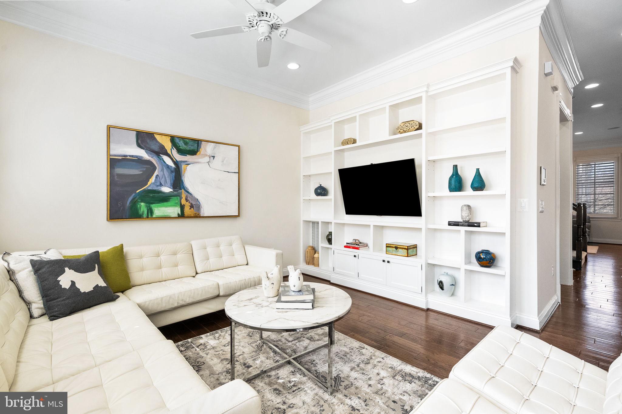1411 Ridgeview Way Washington, DC 20007 - Photo 2 of 56 a living room with furniture and a flat screen tv