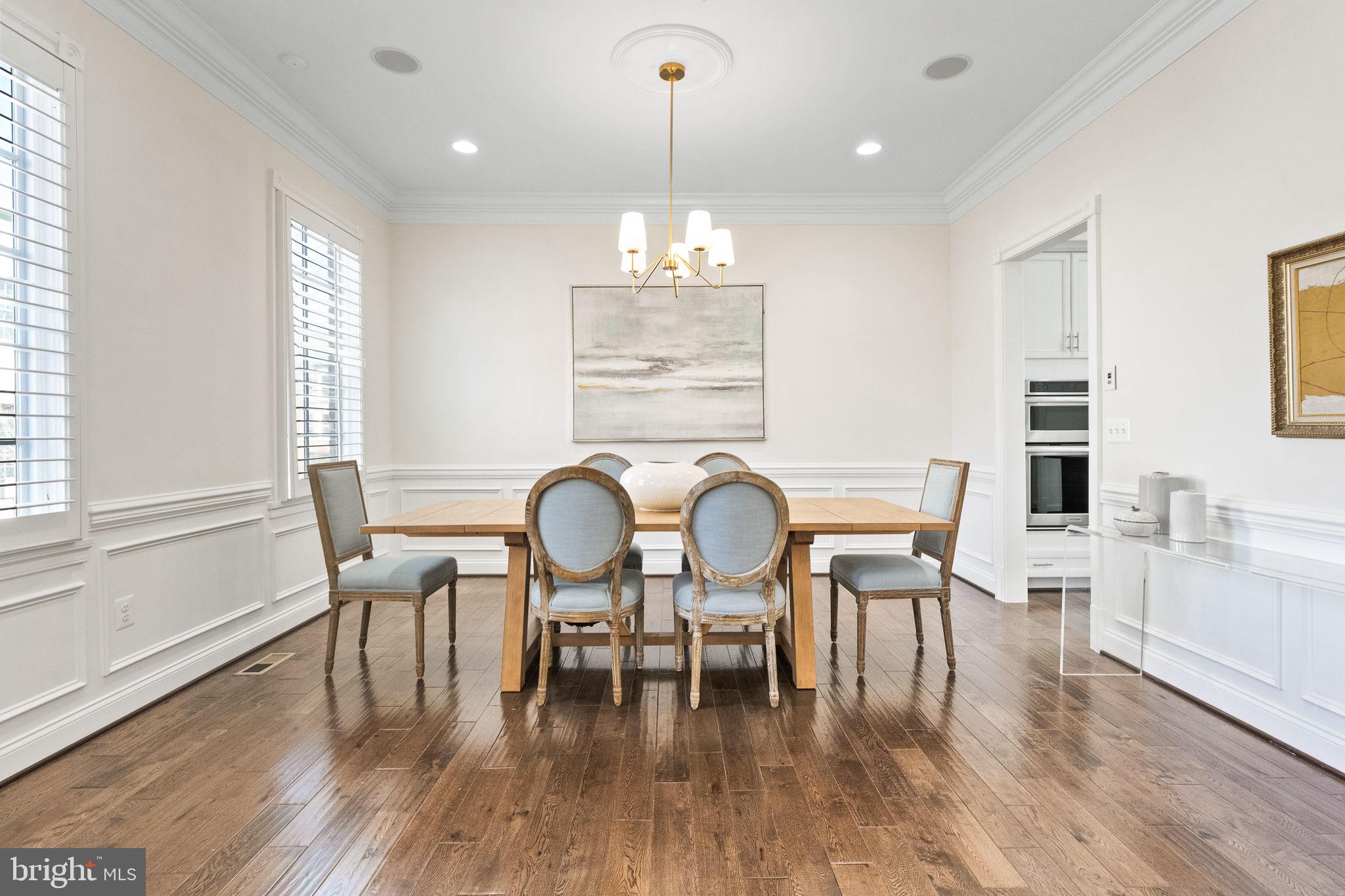 1411 Ridgeview Way Washington, DC 20007 - Photo 21 of 56 a view of a dining room with furniture window and wooden floor