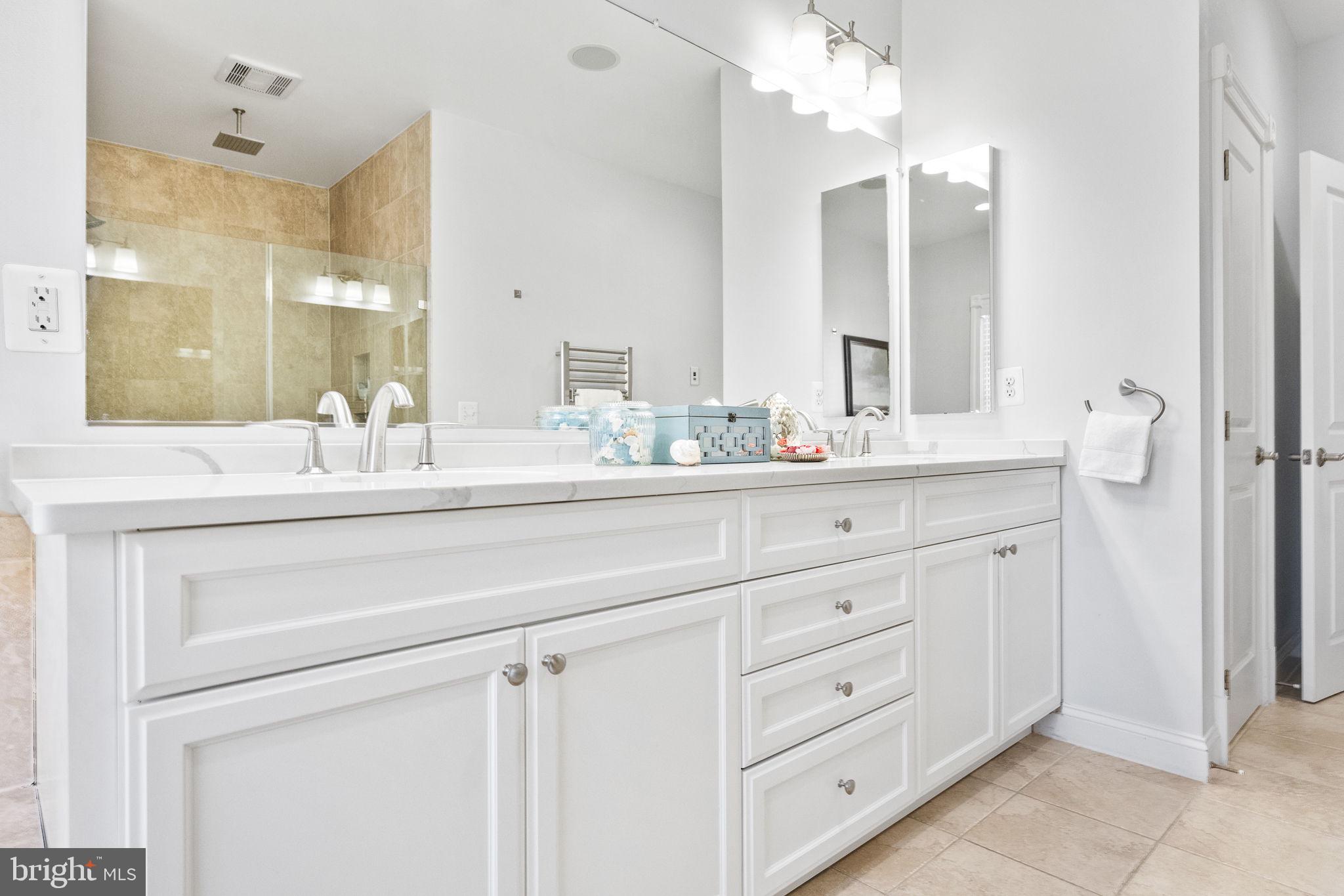 1411 Ridgeview Way Washington, DC 20007 - Photo 30 of 56 a bathroom with double sink and a mirror